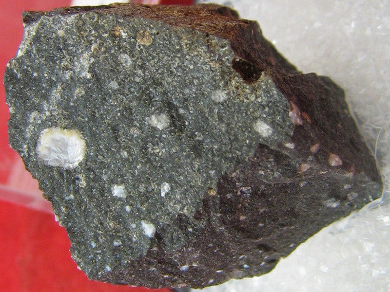 Tacharanite