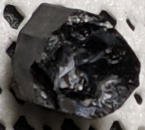 Thucholite from Vitaniemi, Erajavi, Finland. 1.1 cm #428