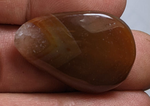 Banded Carnelian Cabochon from Peru. 3.2 cm #22