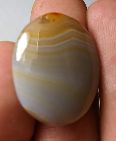Banded Carnelian Cabochon from Peru. 2.9 cm #24